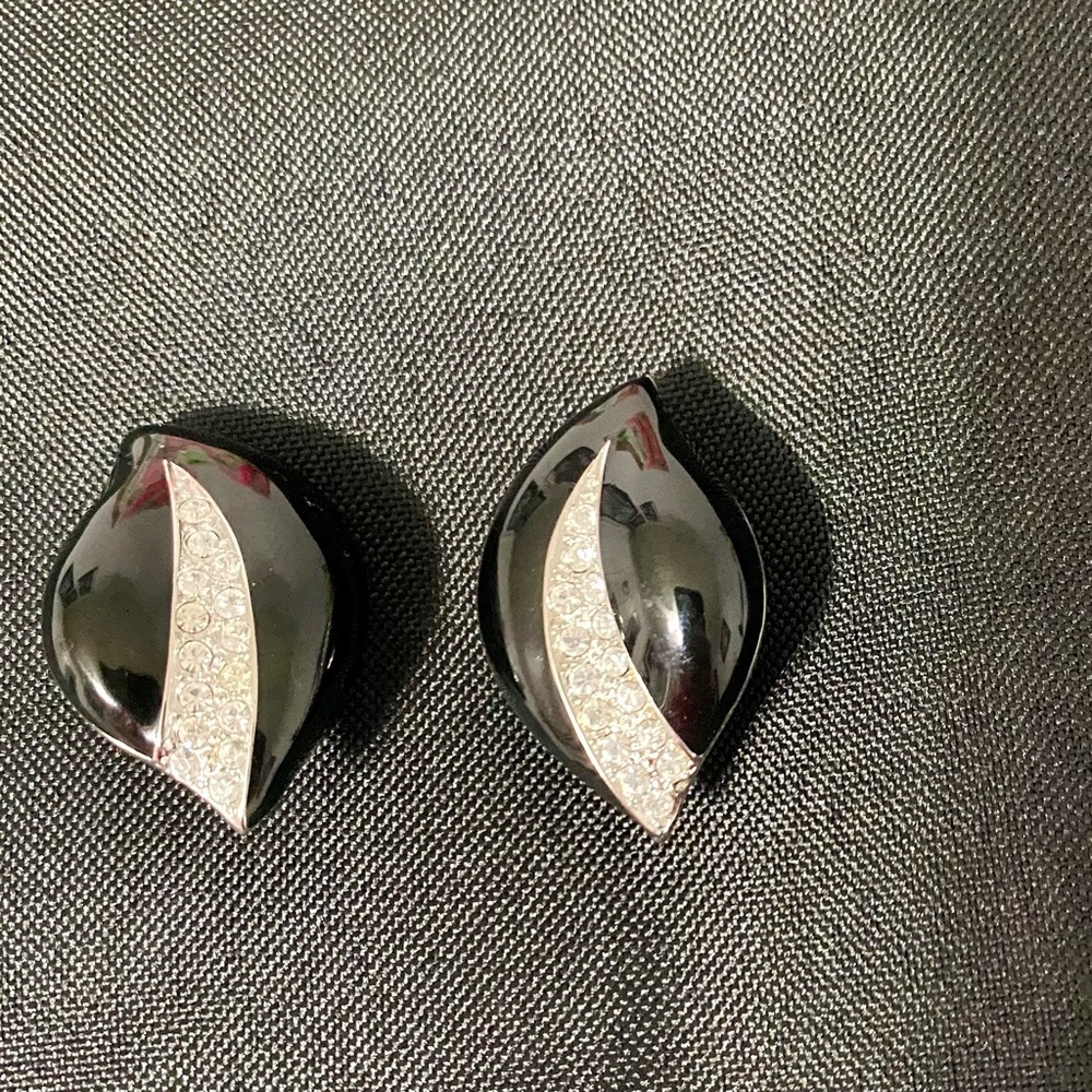 Joan Rivers Black enamel and rhinestone clip on earrings.